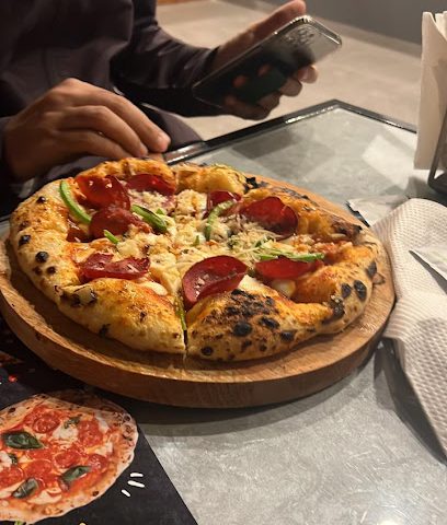 Pizza place - Salalah -