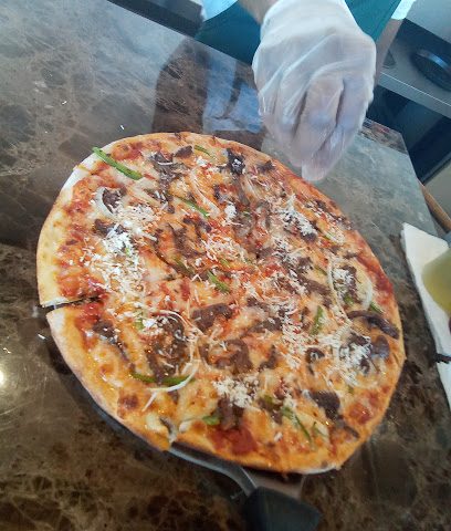 Italiano Pizzeria & Pasta - Seeb - +968 24 450778